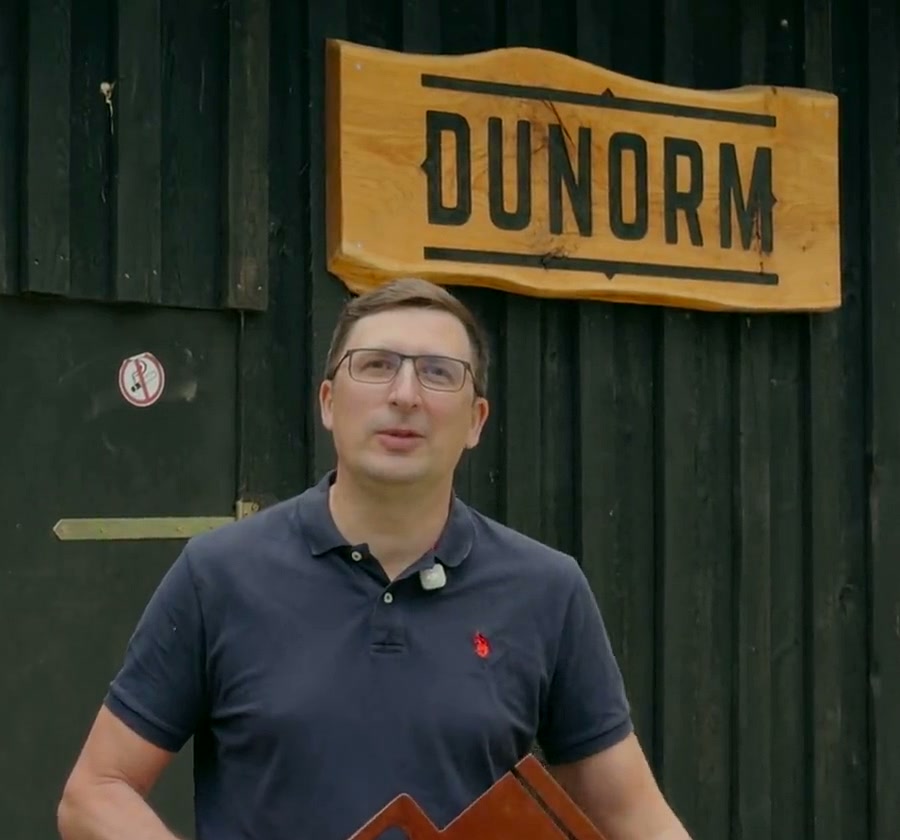 Normunds, the founder of Dunorm, in front of the workshop