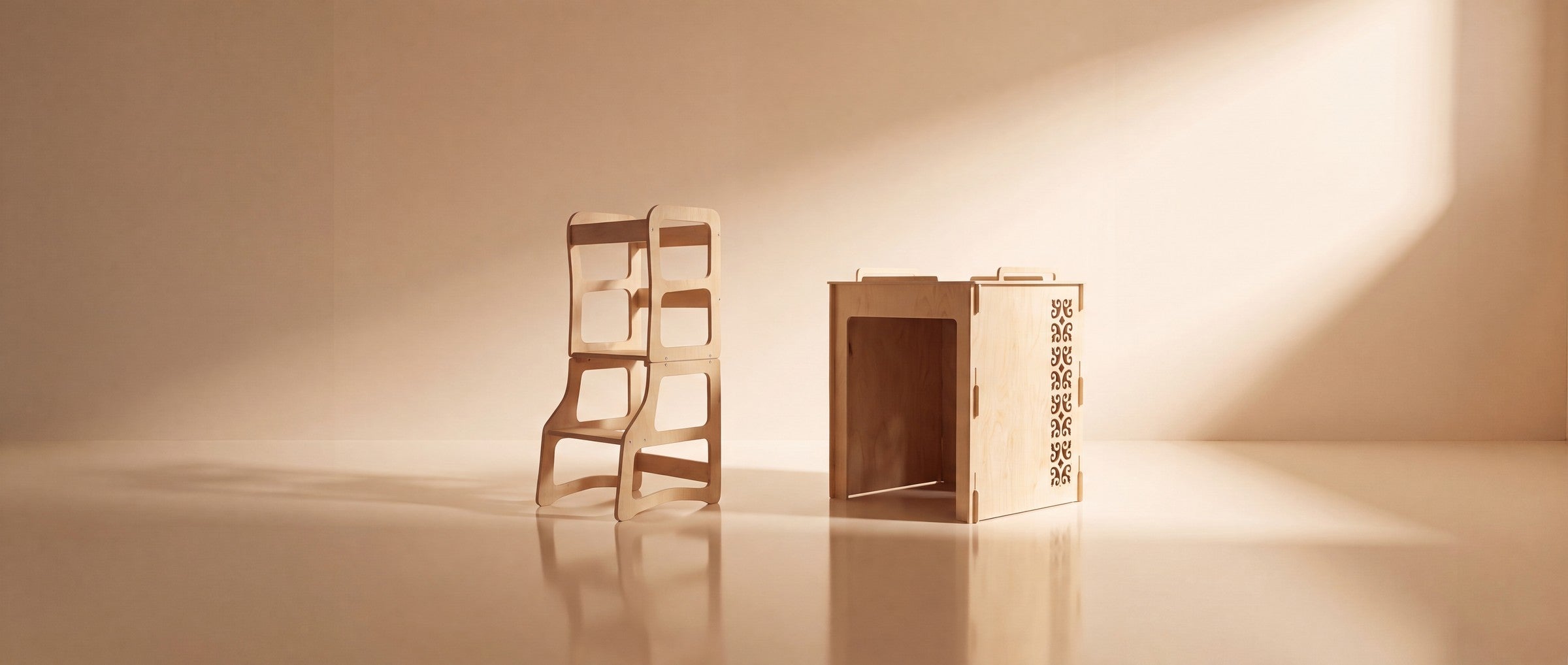 The Dunorm 4-in-1 birch learning tower beside the birch Litter-Robot cover on a warm studio backdrop