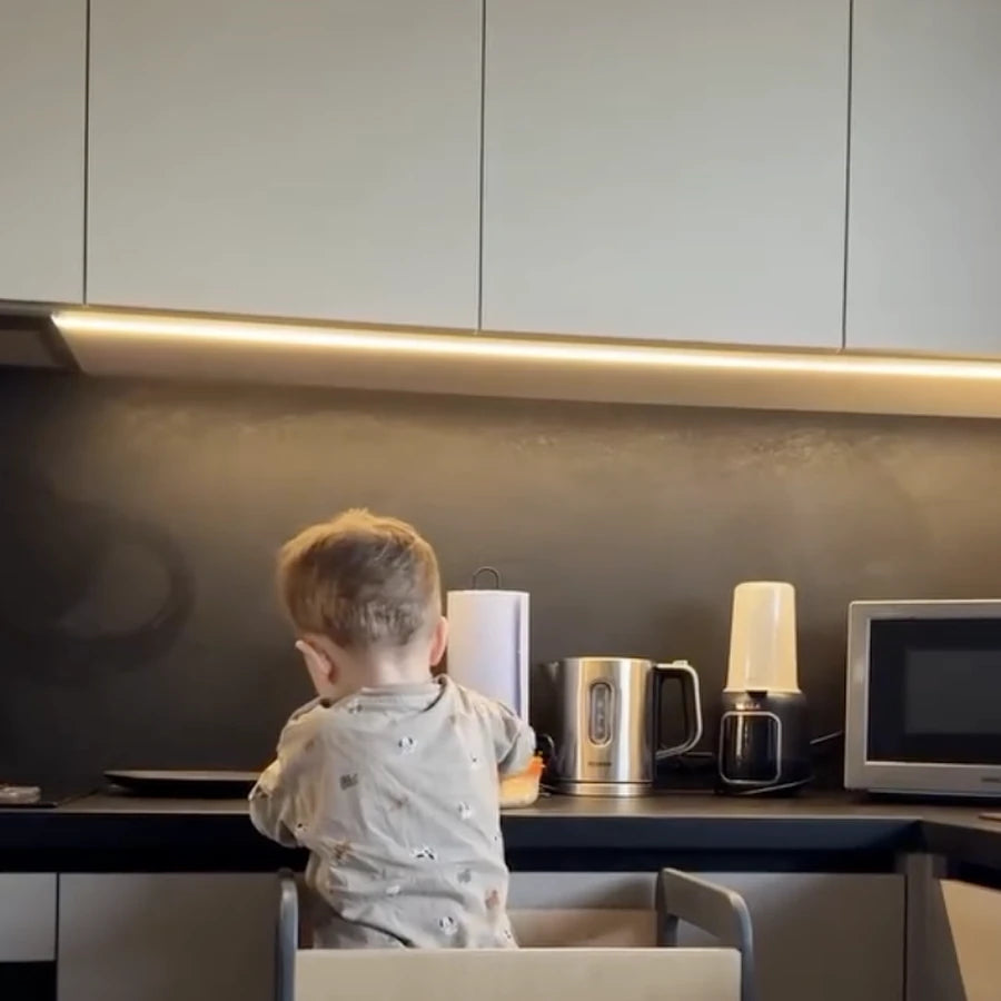 At counter height in the kitchen