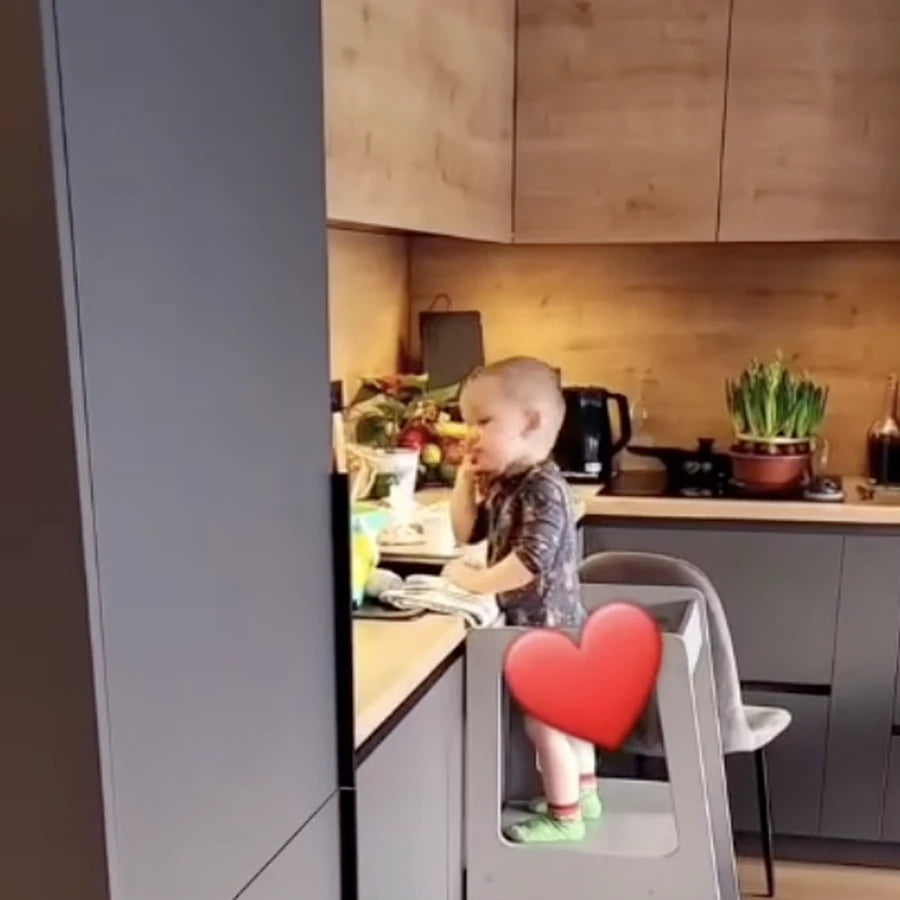 Cooking together in a grey kitchen