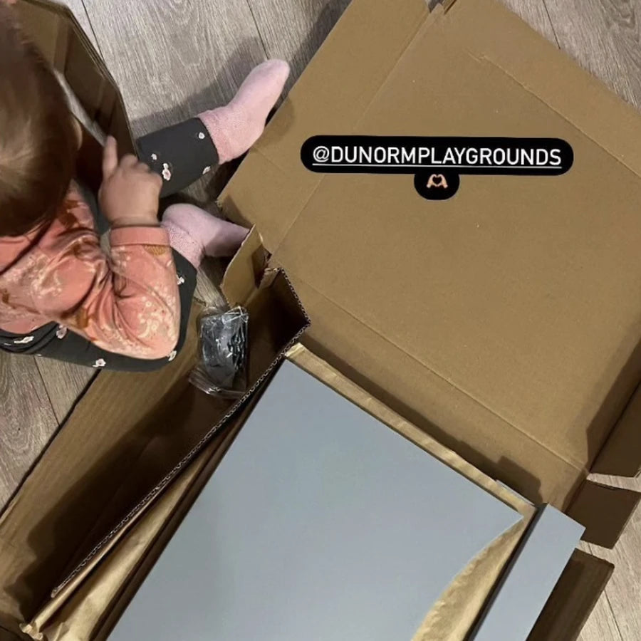 Unboxing the flat-packed tower at home