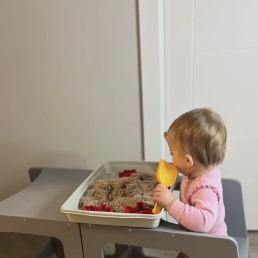 Sensory play at the tower's table